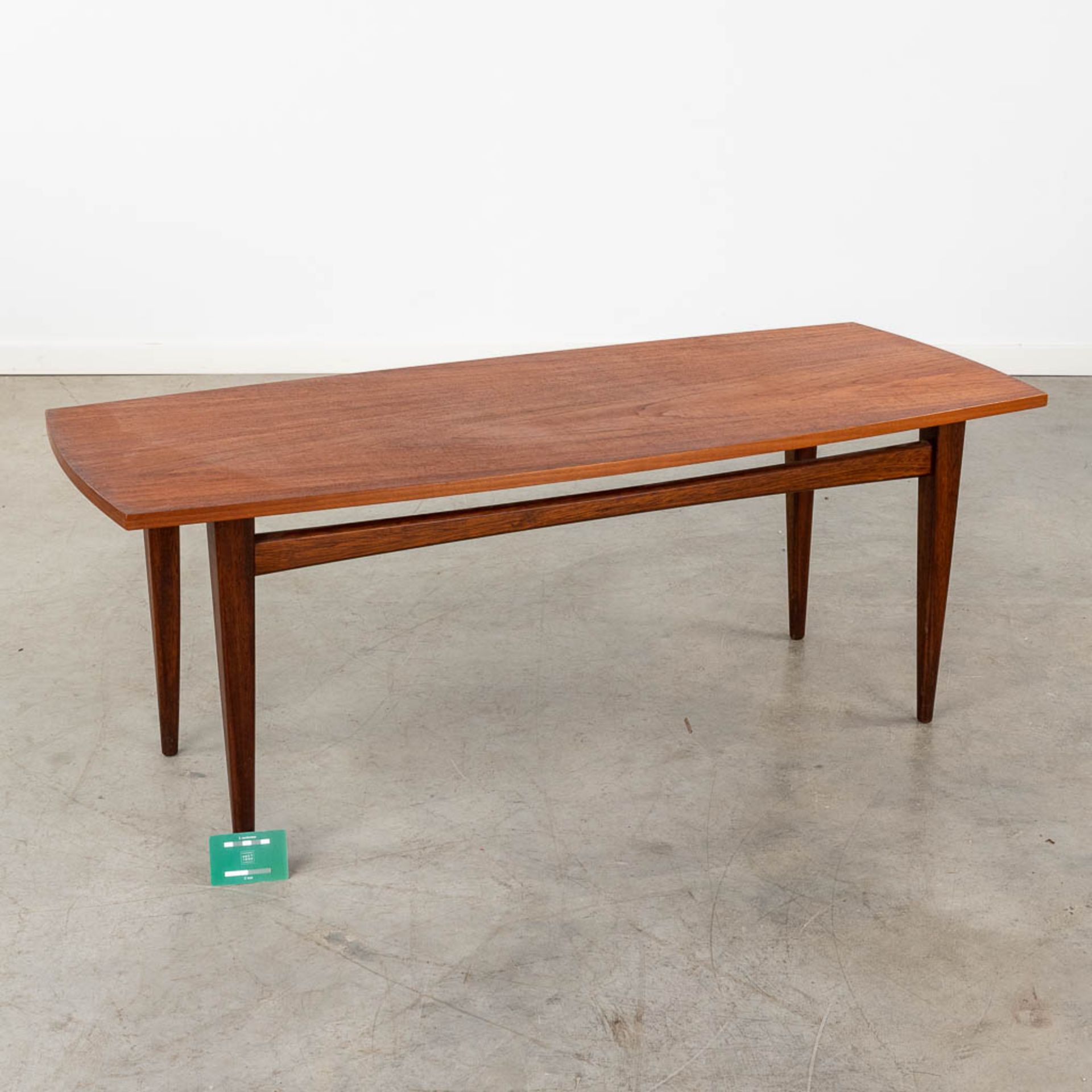 A mid-century Scandinavian coffee table, probably solid teak. (D:50 x W:120 x H:45 cm) - Image 2 of 10