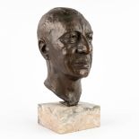 Louis GEORLETTE (XX) 'Bust of a man' patinated bronze on a marble base. (D:23 x W:16 x H:40 cm)