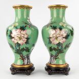 A pair of bronze vases with cloisonné enamel decor of fauna and flora. 20th C. (H:38 x D:22 cm)