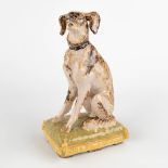 A seated dog on a pillow, Italian Faience, probably 19th C. (D:10,5 x W:15 x H:25 cm)