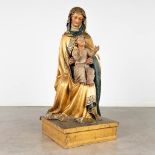 An antique wood-sculptured statue of Saint Anna with child, gilt and polychrome. 18th/19th C. (D:51