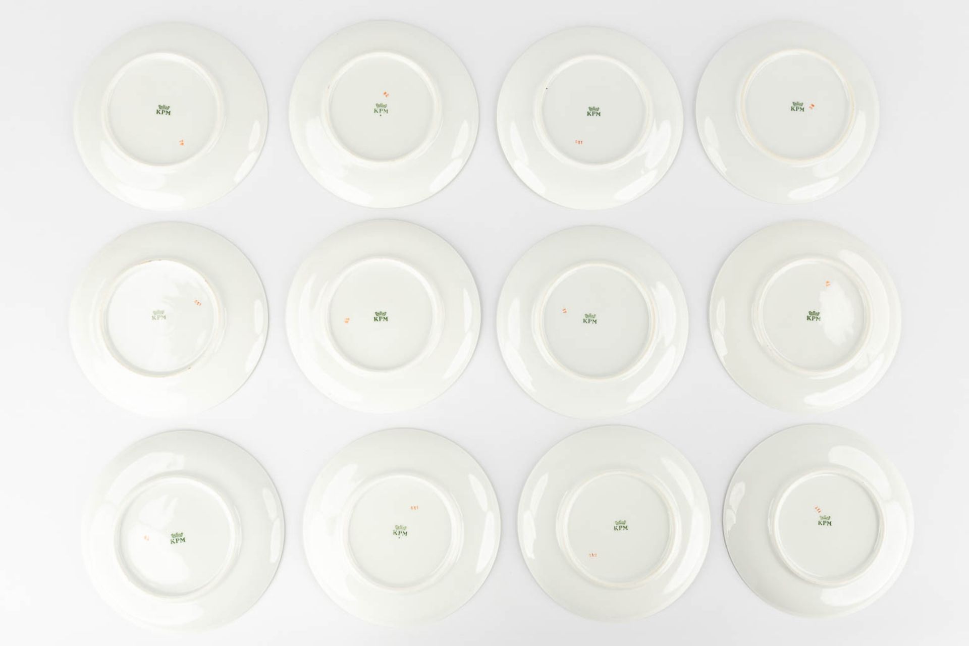 KPM Germany, 12 plates, Polychrome porcelain with transferprinted decor. (D:17,5 cm) - Bild 12 aus 13