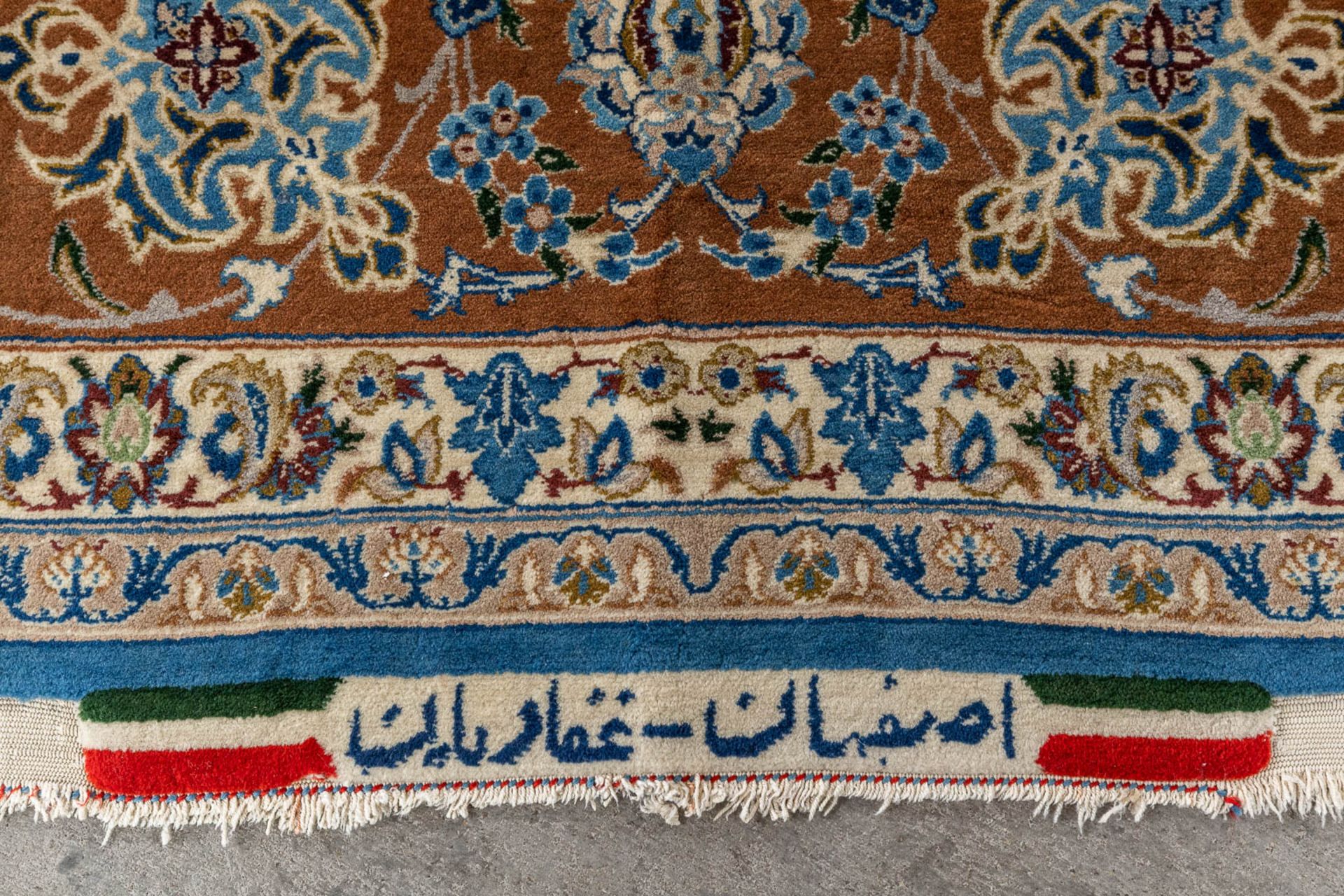 An Oriental hand-made carpet, Isfahan. Signed. (D:238 x W:150 cm) - Image 6 of 8