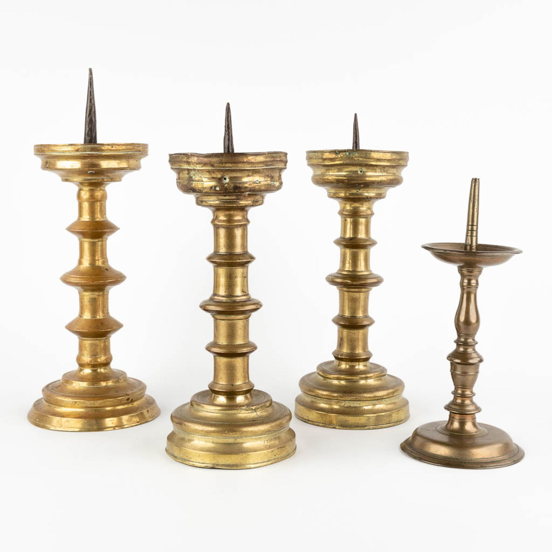 Four candlesticks, bronze, France and Germany, 17th-18th C. (H:36 x D:14 cm)