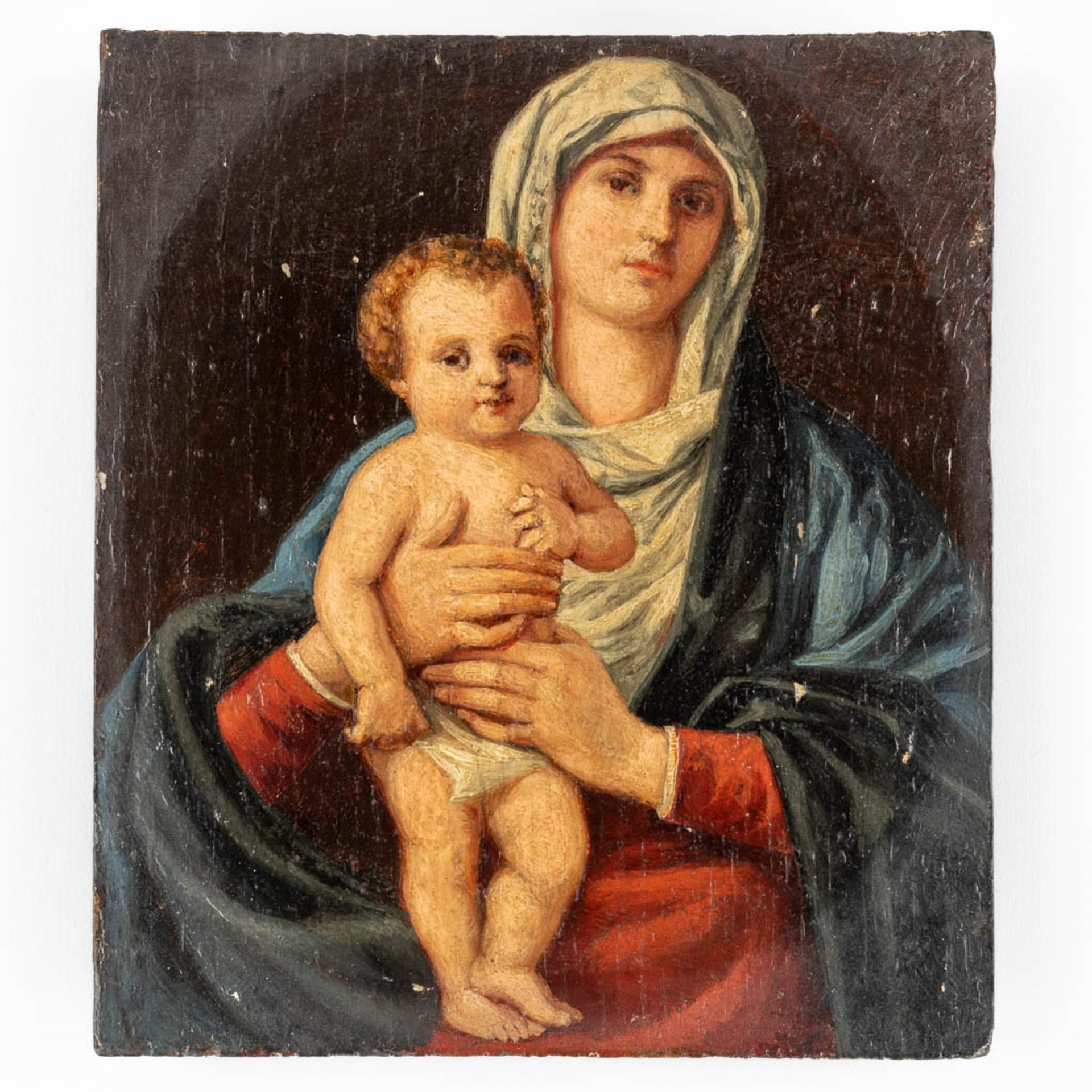 An antique painting 'Madonna with child', oil on panel. Probably 18th C. (W:15 x H:17 cm)