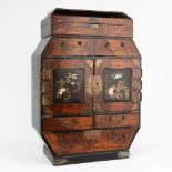An antique Japanese jewelry box or cabinet inlaid with hardwood and mother of pearl. Circa 1900. (D: