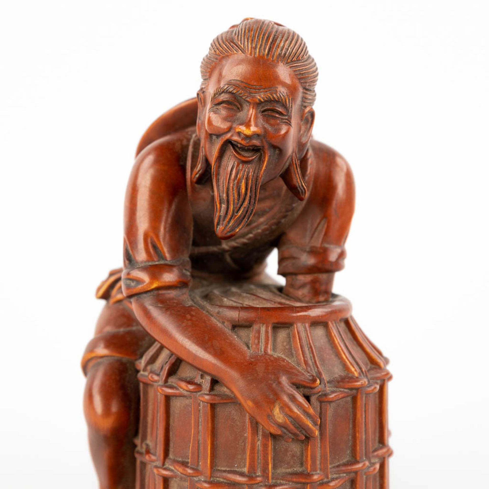 Two Chinese wood sculptures, a fisherman and a brushpot in the shape of a lotus flower. (D:8 x W:8 x - Image 10 of 13