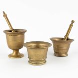 Three mortars with two pestles, bronze. 18th C. (H:12 x D:11 cm)