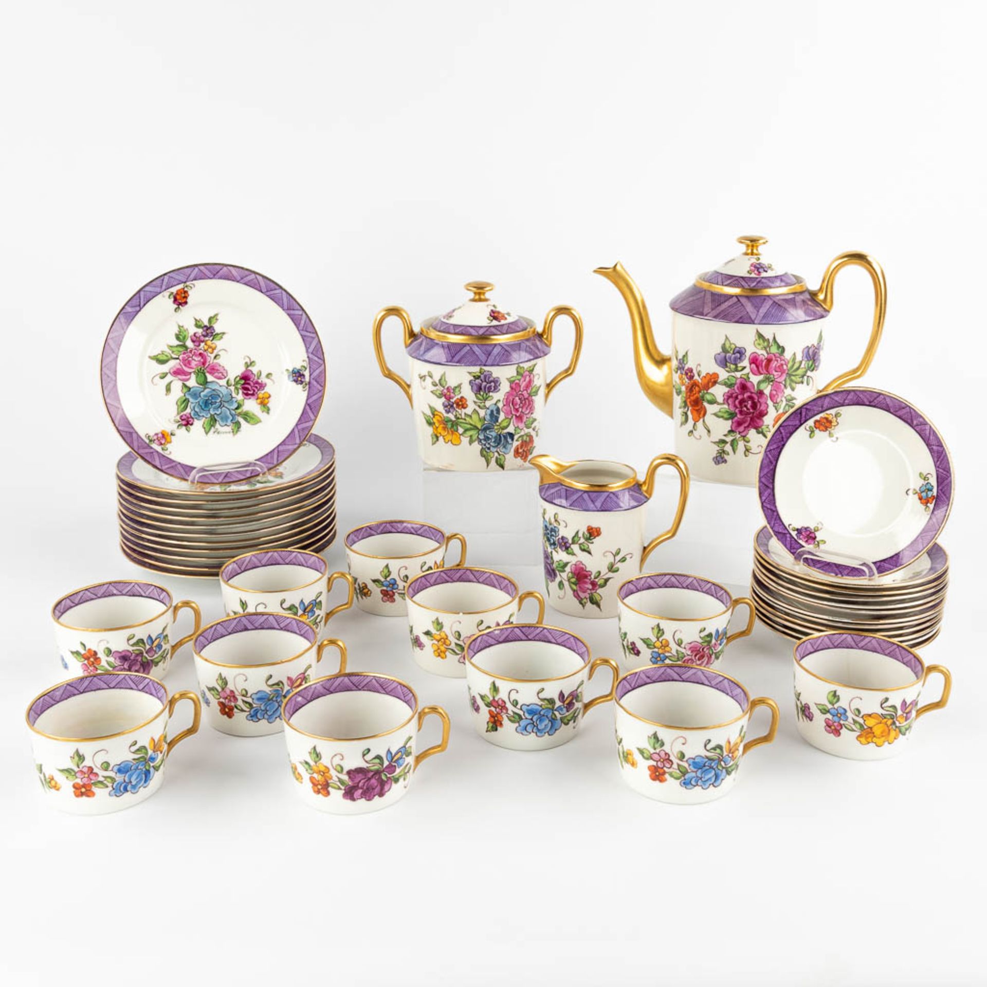 Limoges 'Primrose' a 12-person porcelain coffee service with hand-painted decor. (D:13 x W:24 x H:20