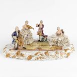 Capodimonte, a large musical group, polychrome porcelain. 20th C. (D:39 x W:52 x H:21 cm)