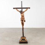 A wood sculptured corpus christi, hanging from the cross. 17th C. (D:18 x W:51 x H:125 cm)