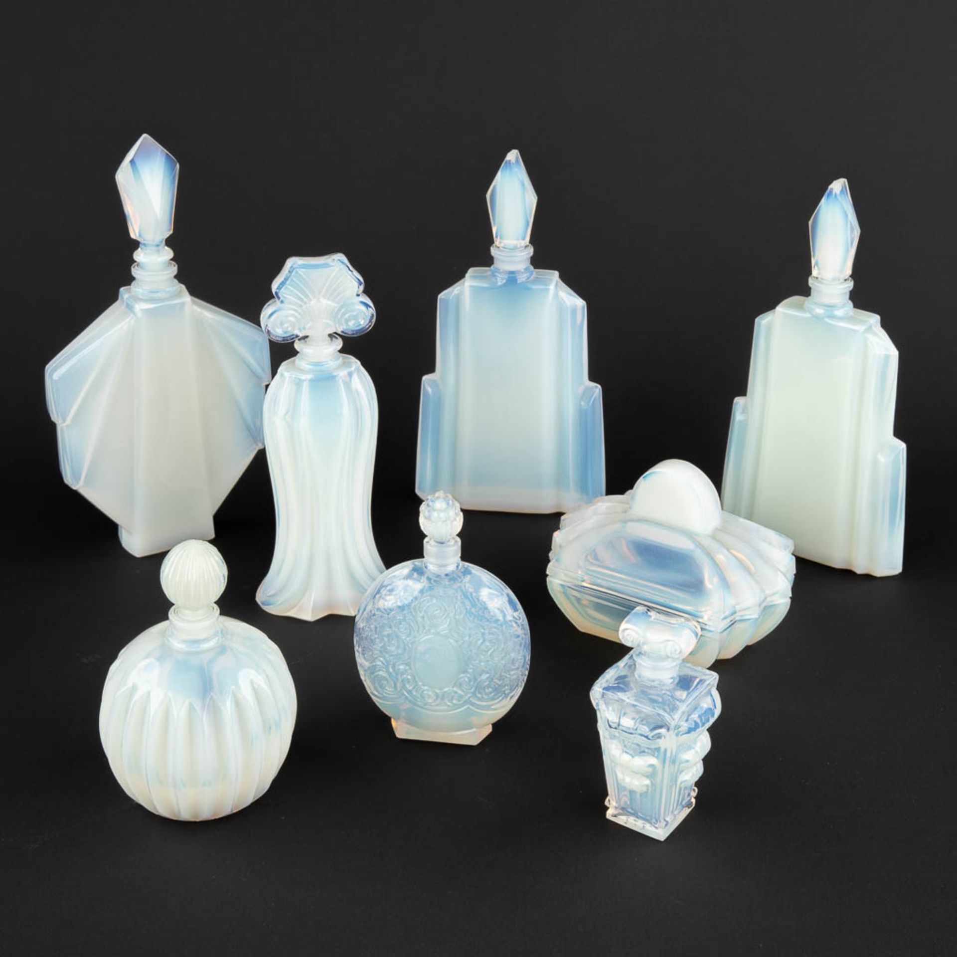 8 perfume bottles, Sabino, Opaline glass. (W:9 x H:18 cm)
