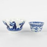 Two Chinese bowls, blue-white decor of the 8 immortals and a flower decor. 18th/19th C. (H:5 x D:9,5
