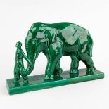 A figurine with an Elephant, Glazed faience, Art Deco. Signed STEF, Saint Clément. (D:11 x W:48 x H: