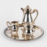 Christofle, a Chocolatière, sugar pot and milk jug on a serving tray. Silver-plated metal. (H:26 x D