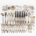 A large collection of silver cutlery and table accessories. 19th and 20th C. 2,140 kg.