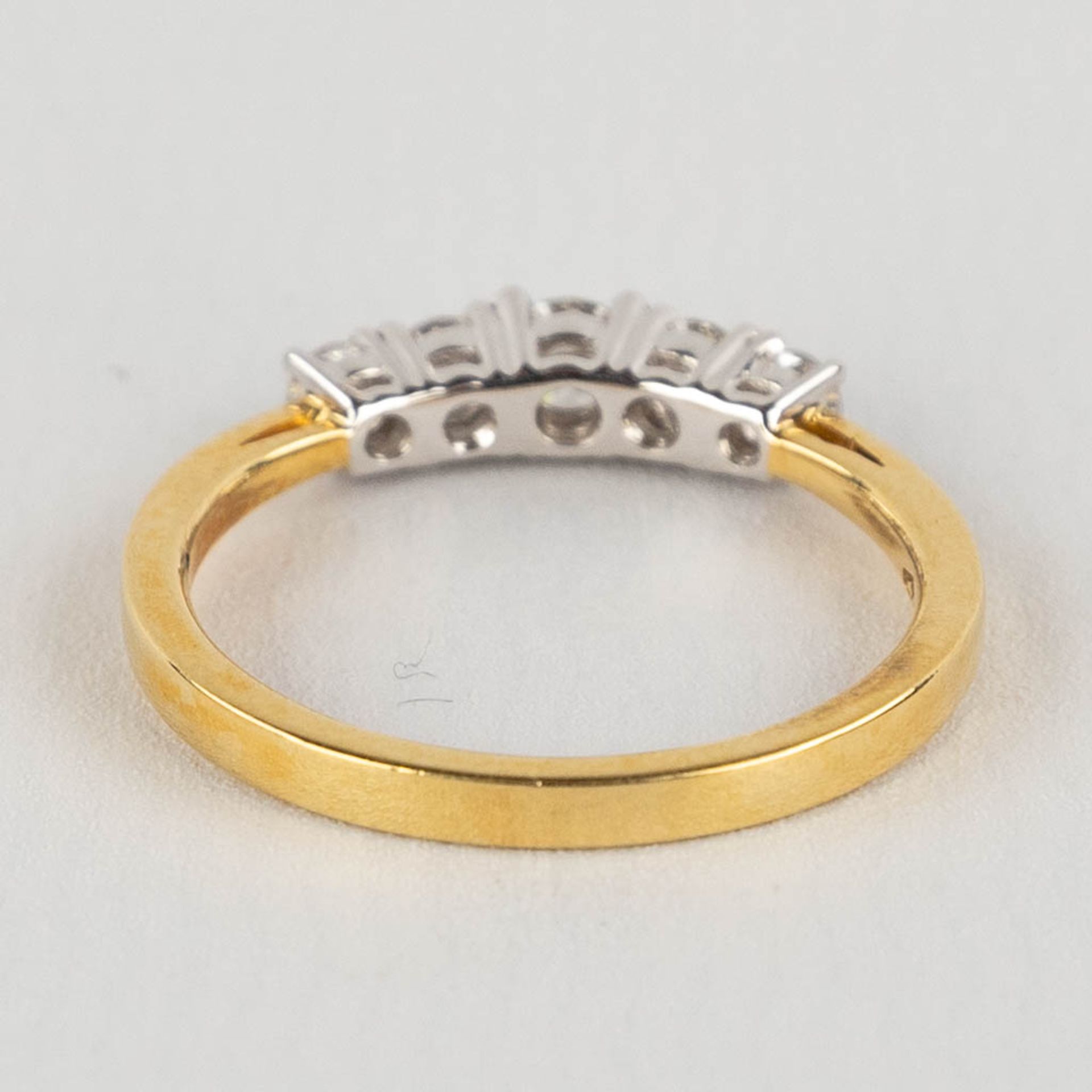 A ring, 18kt yellow and white gold with 5 diamonds, appr. 0,52ct. Ring size 54. - Image 5 of 11