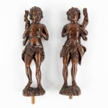 A pair of wood-sculptured figurines of young men, 18th C. (H:34 cm)