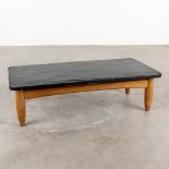 A large mid-century coffee table with a slate top, circa 1960. (D:60 x W:120 x H:34 cm)