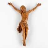 An antique and sculptured 'Corpus Christi', probably palm wood, 19th C. (W:28 x H:35 cm)