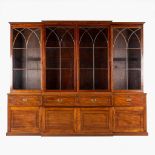 A monumental and antique English bookcase or library cabinet. 19th C. (D:63 x W:317 x H:262 cm)