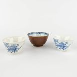 Three Chinese bowls, Capucine porcelain, two with a blue-white decor of birds and prunus flowers. 18