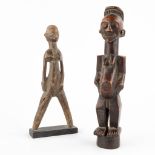 Two African figurines 'Songye and a Slingshot'. (H:26 cm)