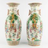 A pair of Chinese Famille Rose vases. 20th C. (H:58 x D:22 cm)