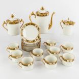 A 21-piece porcelain coffee service, Limoges. (D:11 x W:22 x H:22 cm)