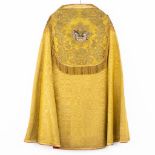 A lithurgical vestment 'Cope', thick gold thread embroideries with an image of a chalice with anchor