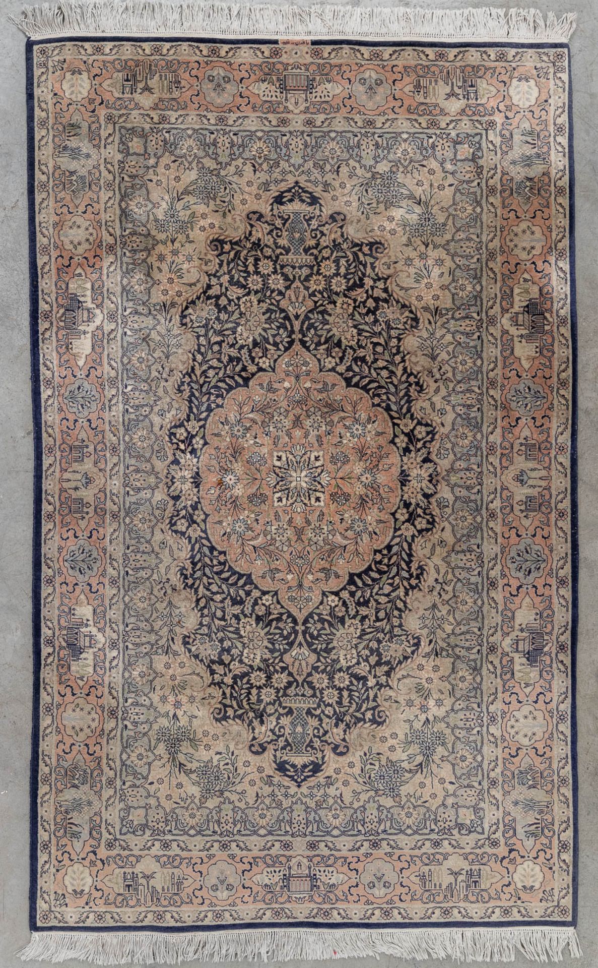 A hand-made Oriental carpet, Mogul, Pakistan. Wool. (D:221 x W:139 cm)