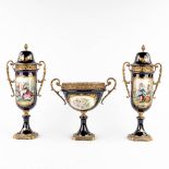 A three-piece mantle garniture, marked A.C.F. Sèvres. Porcelain mounted with bronze. 20th C. (D:11 x