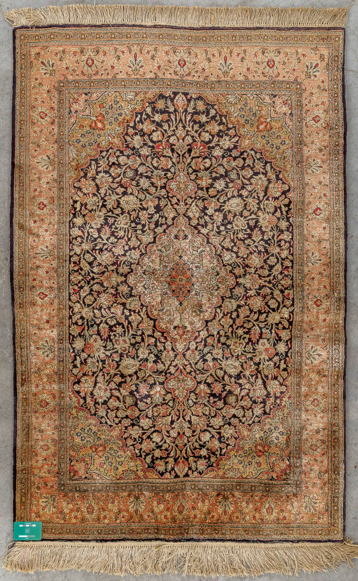 An Oriental hand-made carpet, silk and wool, Tabriz. (D:104 x W:160 cm) - Image 2 of 10