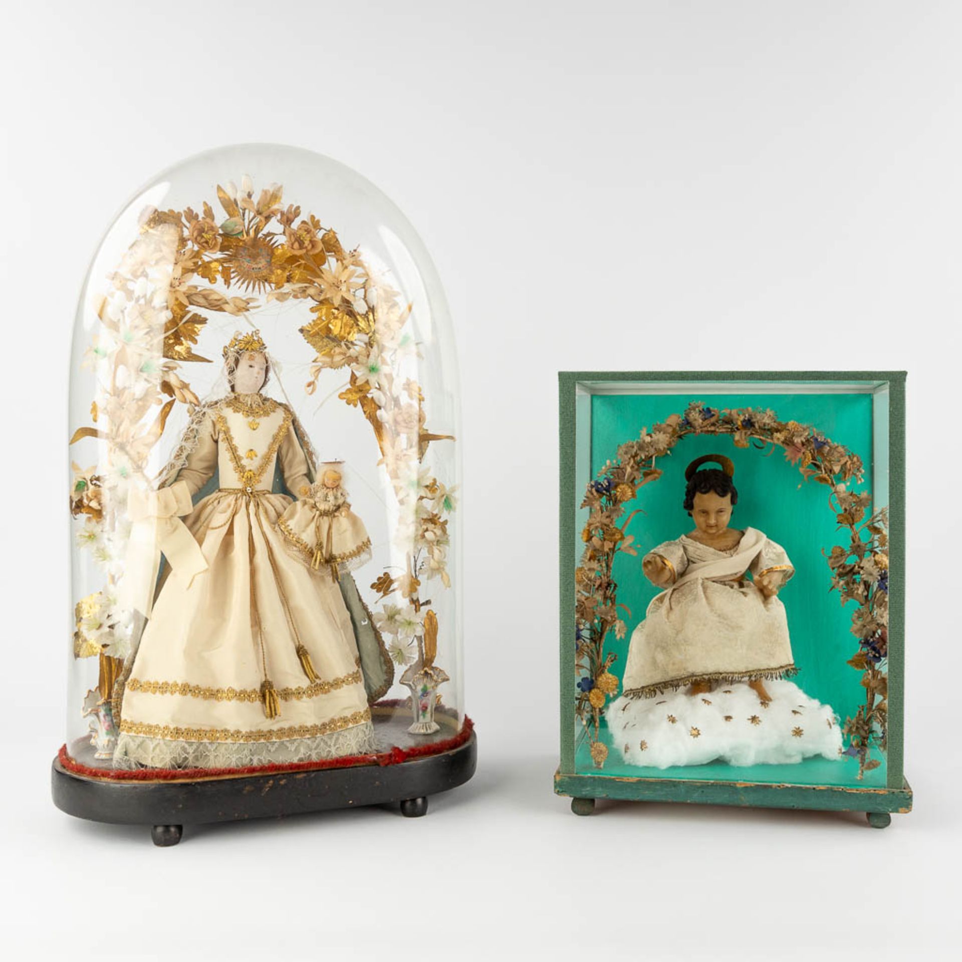 A shrine with a wax figurine of Jesus Christ, and a dome with an image of Madonna. 19th/20th C. (D:2