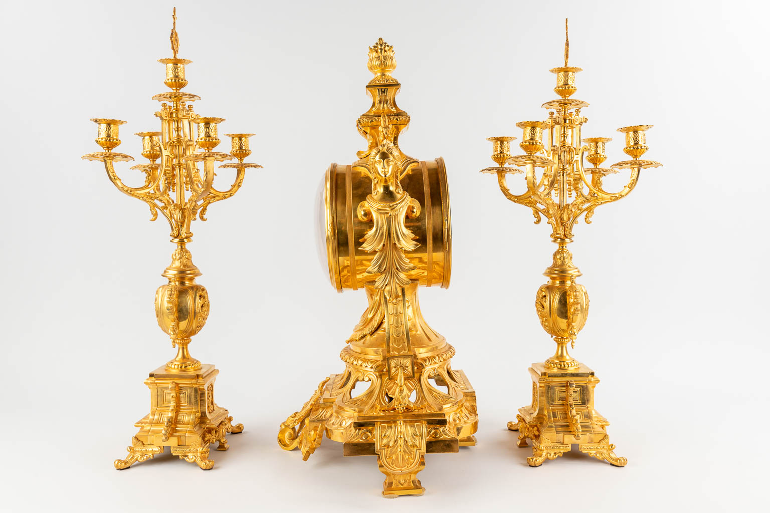 A three-piece mantle garniture clock and candelabra, gilt bronze in Louis XV style. 19th C. (D:28 x - Image 8 of 16