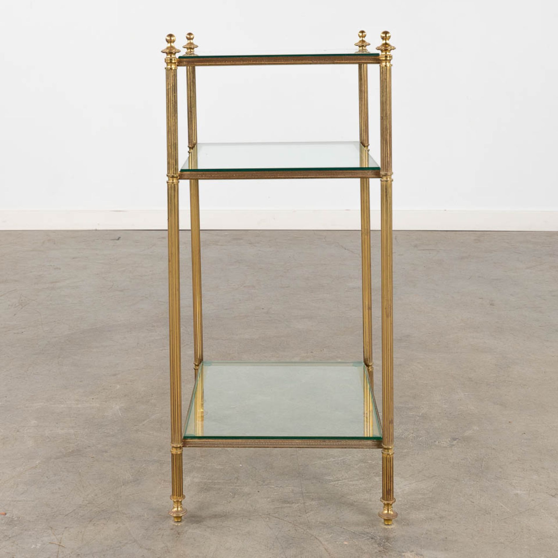 A two-tier side table, brass and glass in the style of Maison Jansen. (D:32 x W:40 x H:70 cm) - Image 6 of 9