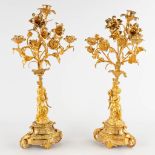 A pair of candelabra with putti, gilt bronze. Circa 1900. (W:22 x H:50 cm)