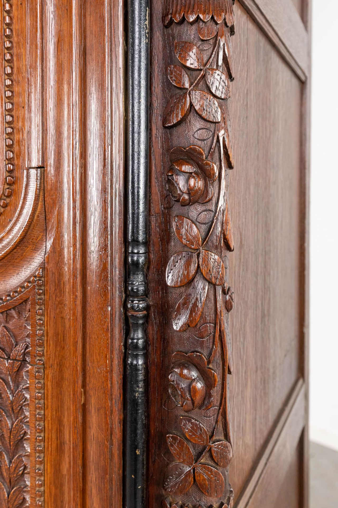 A richly sculptured and antique Normandy high cabinet, Armoire. France, 18th C. (D:68 x W:175 x H:23 - Image 9 of 21