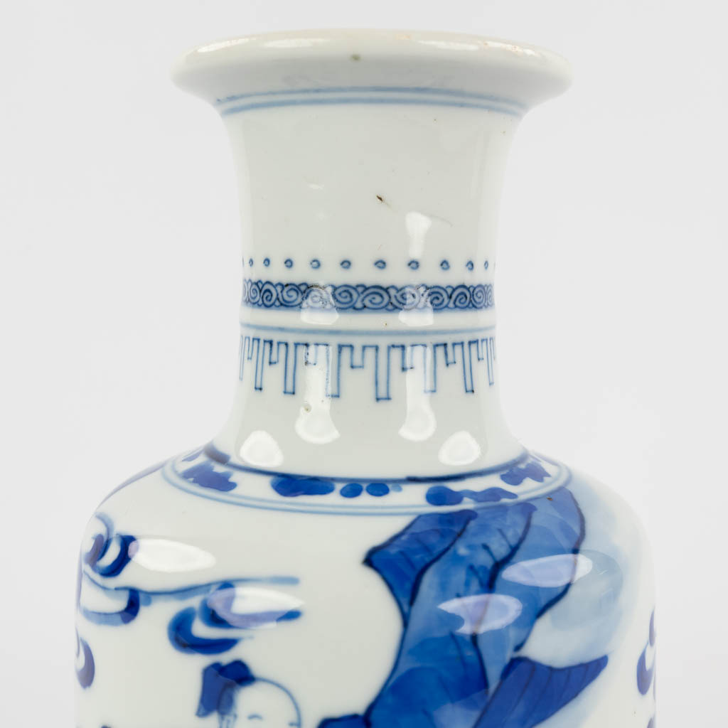 A Chinese vase decorated with blue-white figurines, 18th/19th C. (D:10,5 x W:10,5 x H:26 cm) - Image 11 of 12