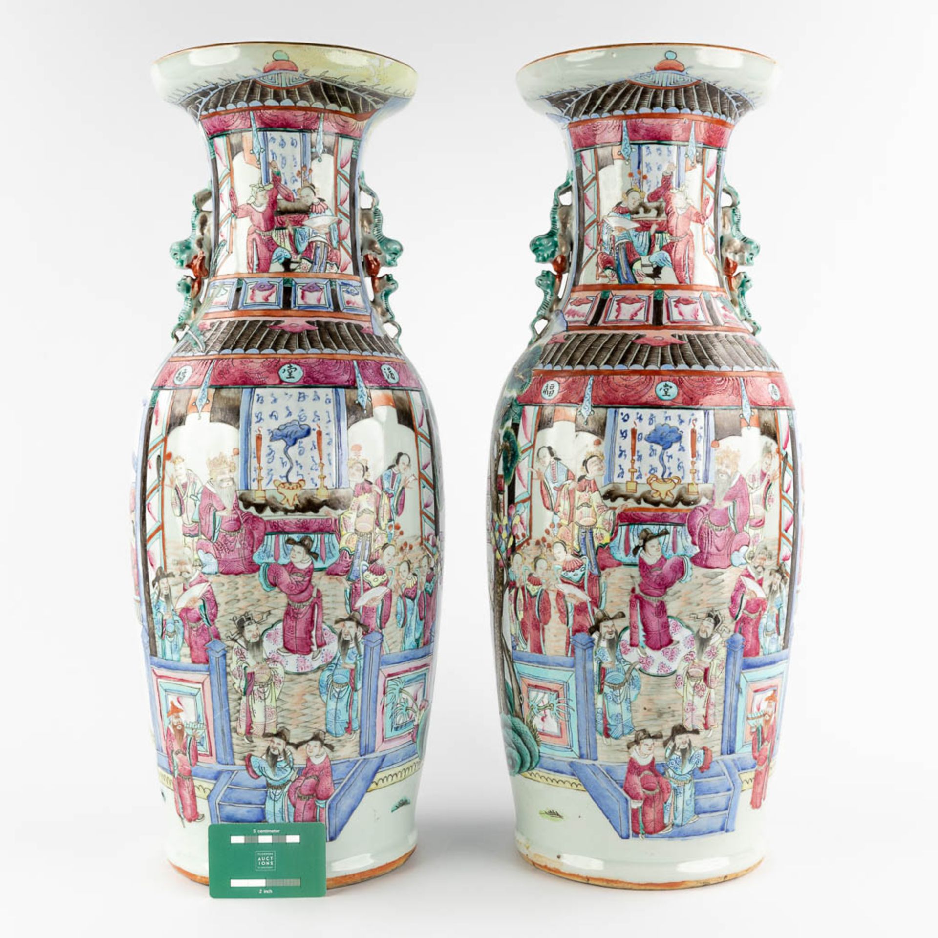 A pair of Chinese vases with Famille Rose vases with a temple scène, 19th C. (H:61 x D:23 cm) - Image 2 of 12