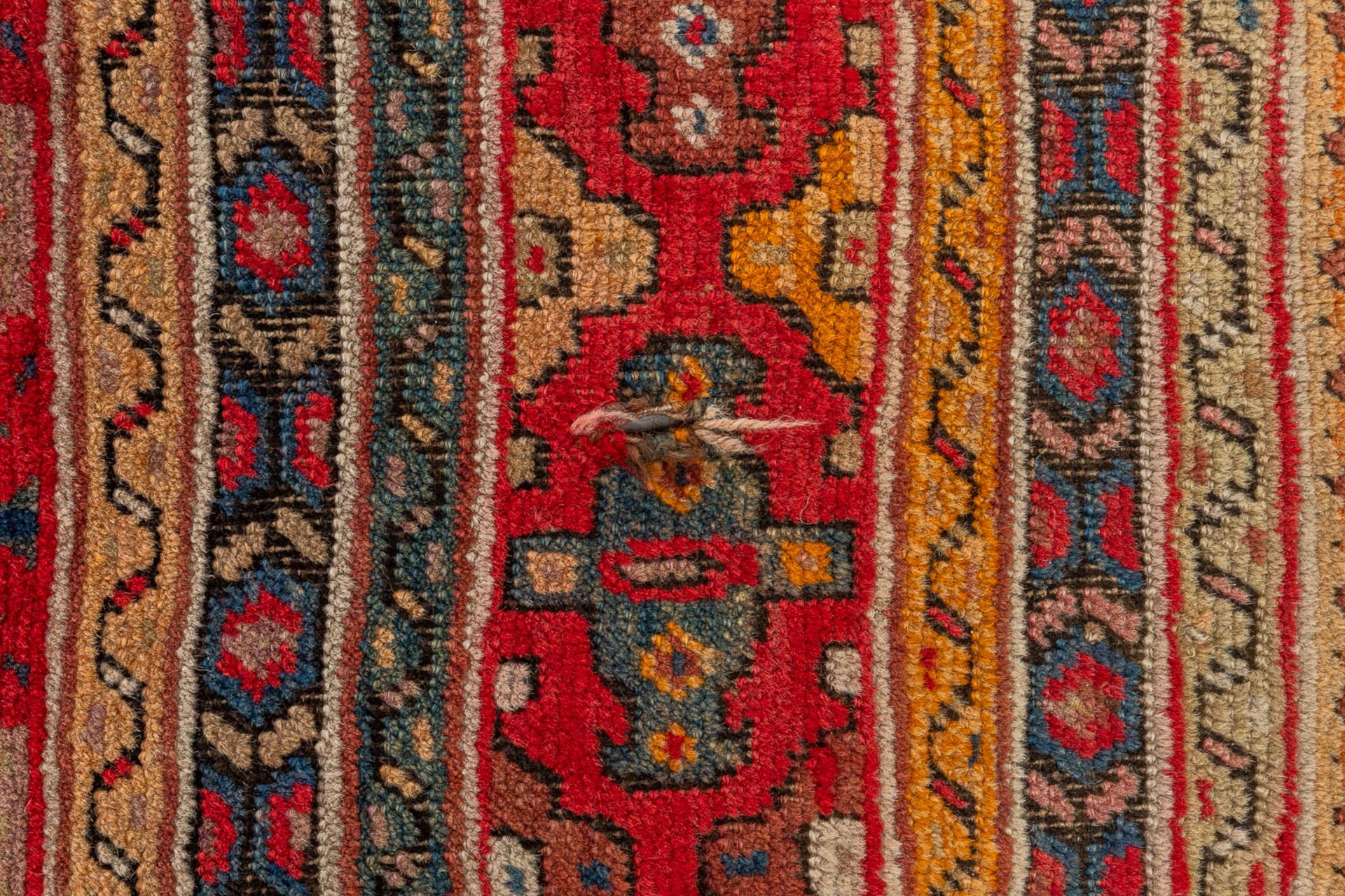 An Oriental hand-made carpet, Karabach (D:290 x W:128 cm) - Image 5 of 8