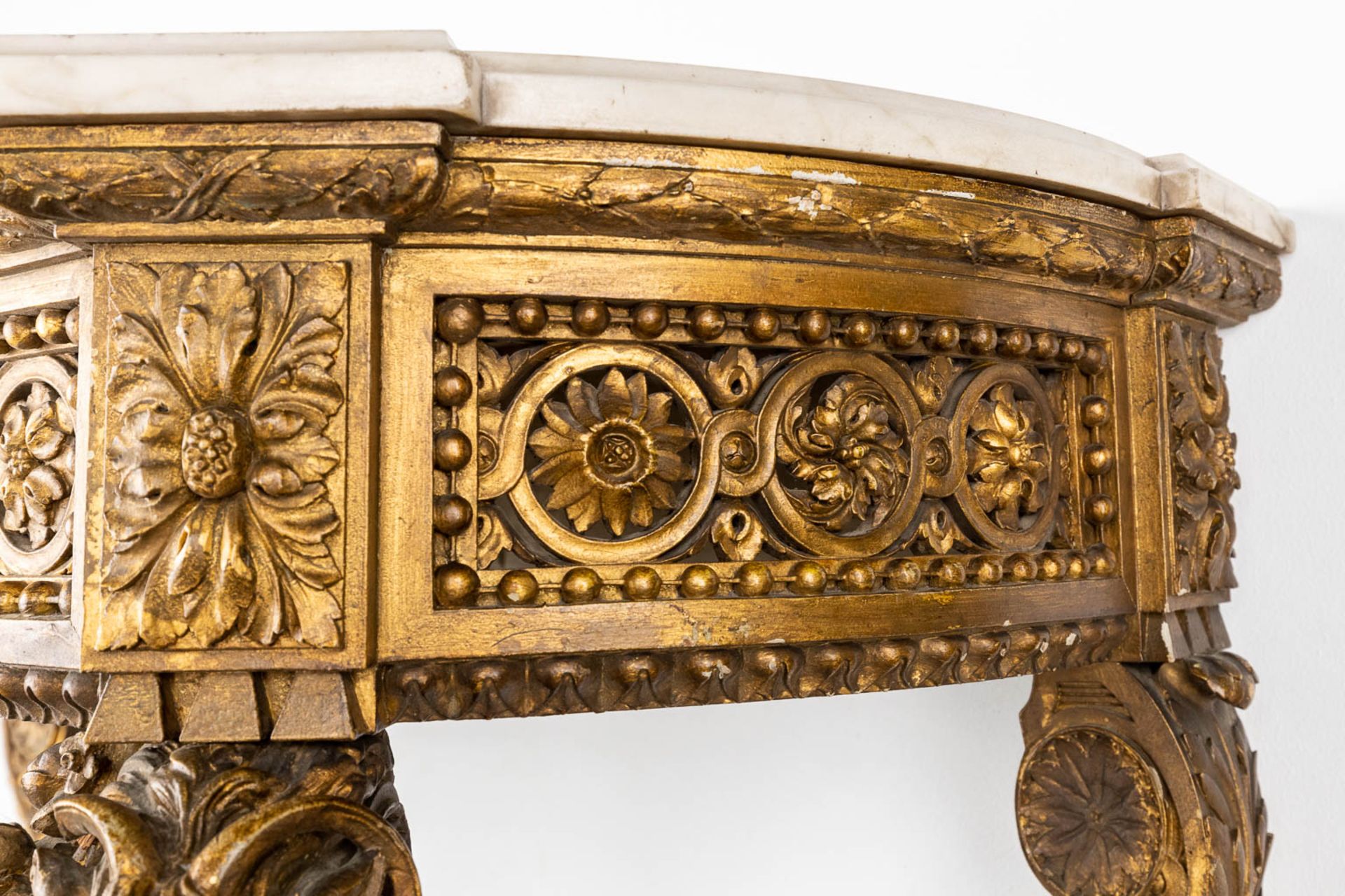 A console table with ram's heads, gilt and sculptured wood and a Carrara marble top. 19th C. (D:41 x - Image 6 of 15