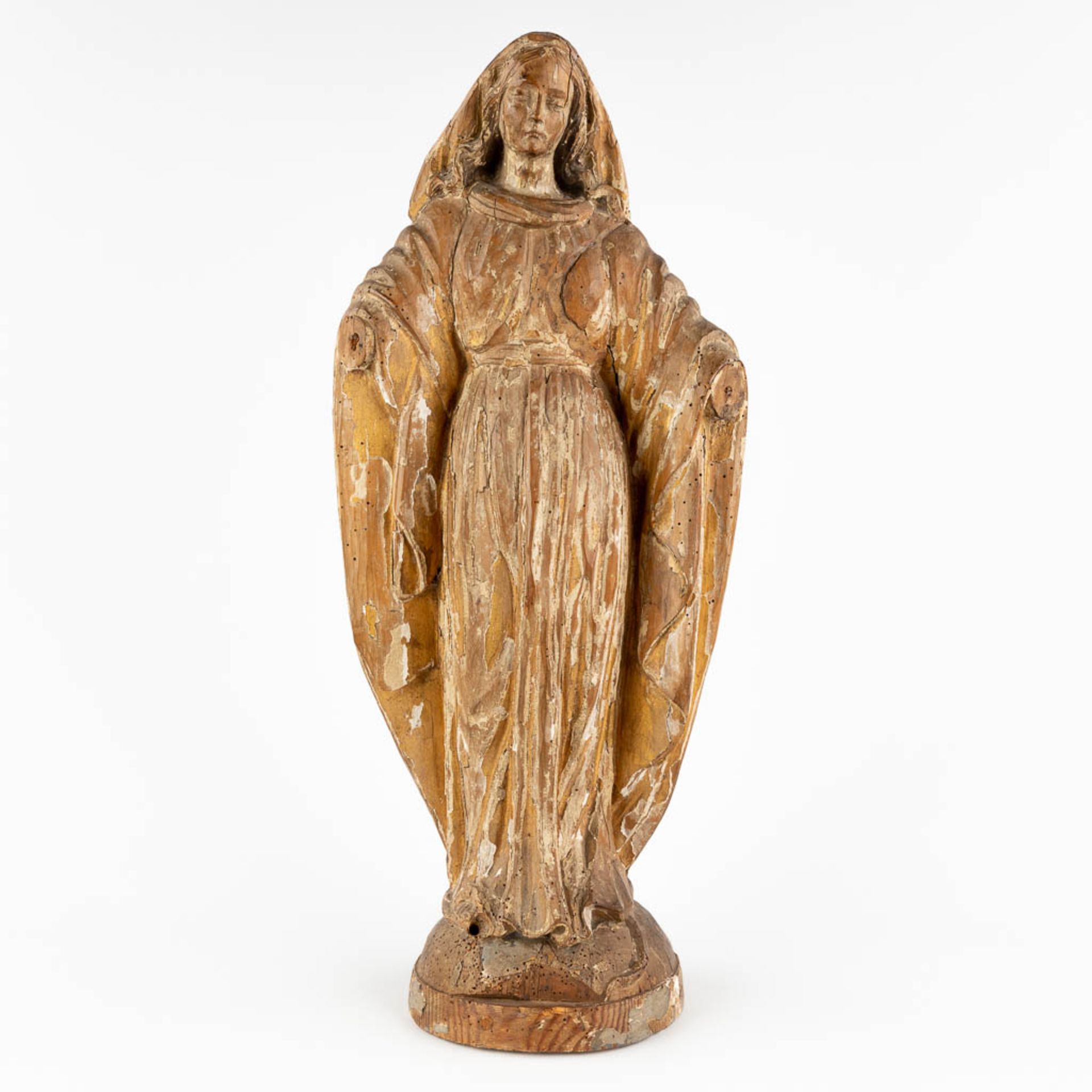 A wood-sculptured Madonna, remains of the original patina. 18th C. (D:15 x W:26 x H:62 cm)