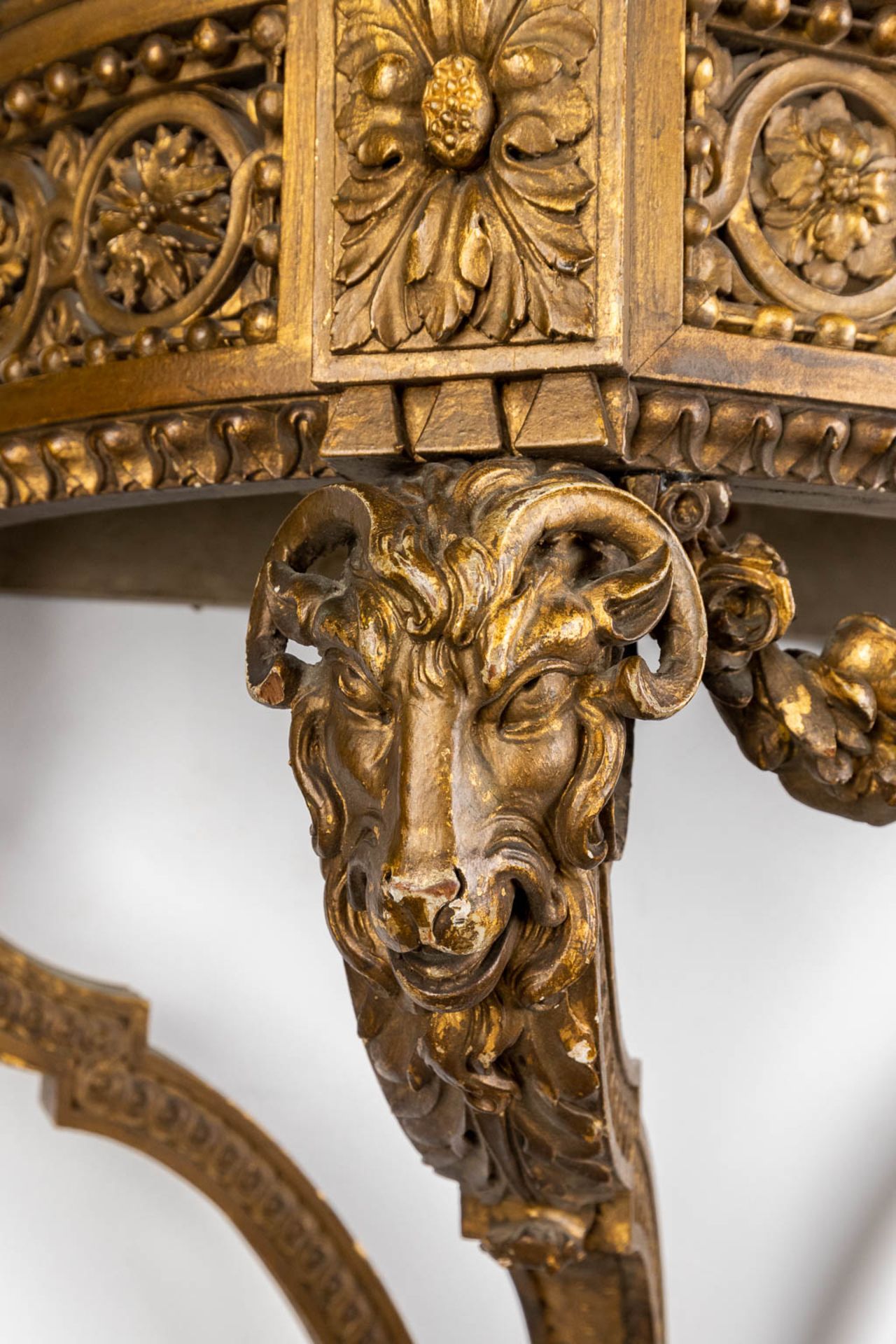 A console table with ram's heads, gilt and sculptured wood and a Carrara marble top. 19th C. (D:41 x - Image 9 of 15