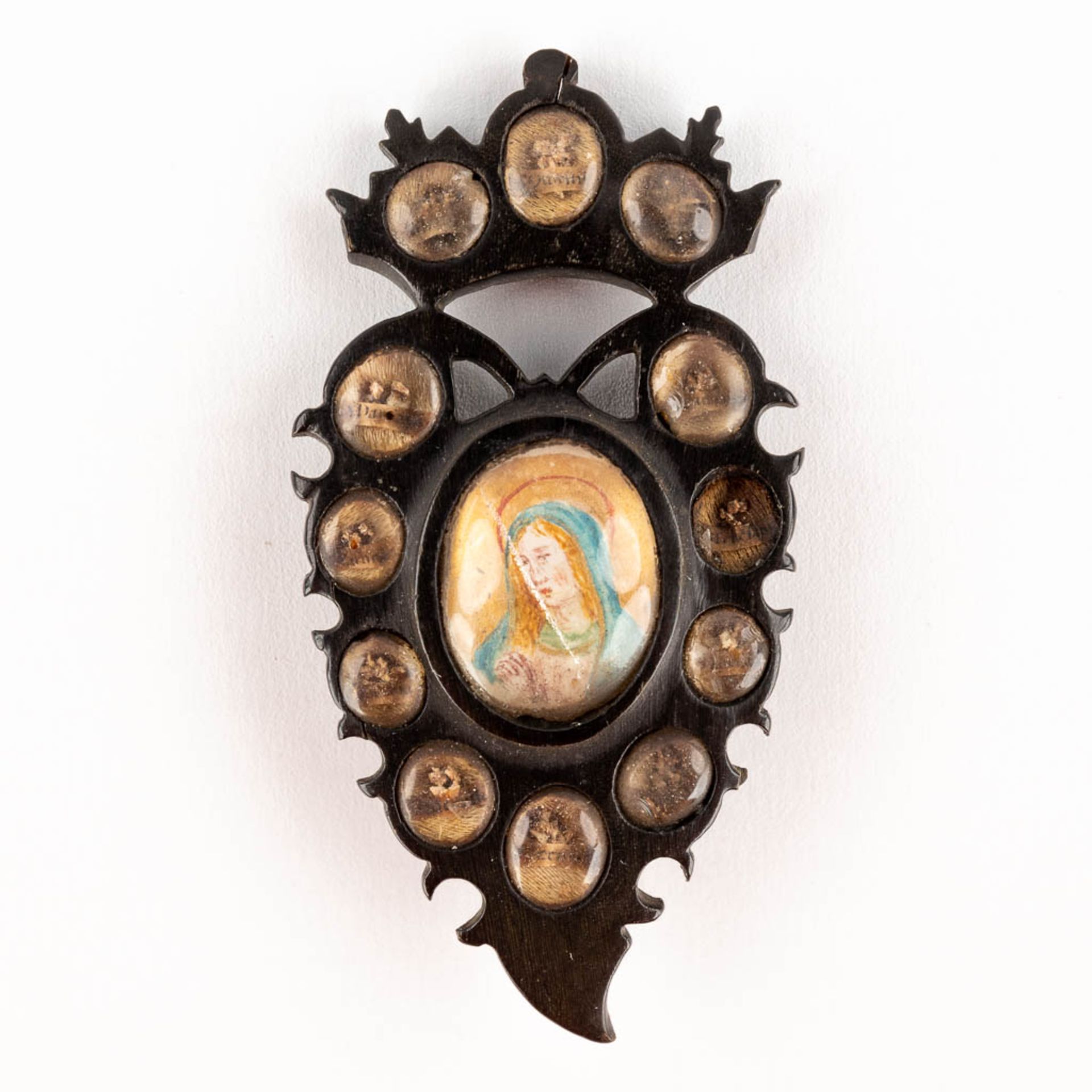 A small collection of relics and reliquary items, The Veil of Veronica, a relic in the shape of a sa - Image 3 of 11