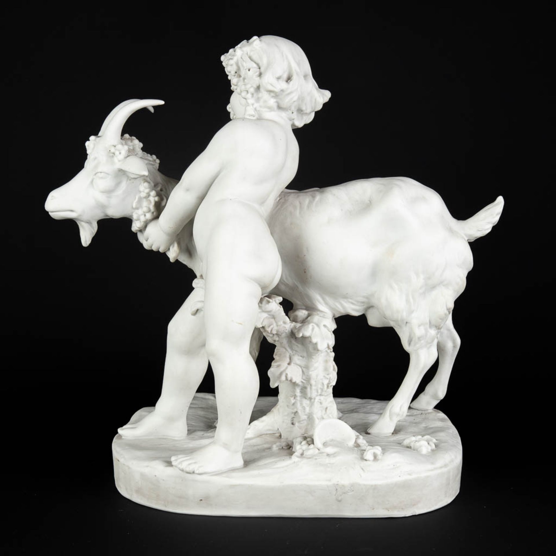 FAGOTTO (XIX-XX) 'Child with a ram' Bisque porcelain, marked Sèvres, Paris. (D:19 x W:33 x H:32 cm) - Image 4 of 12