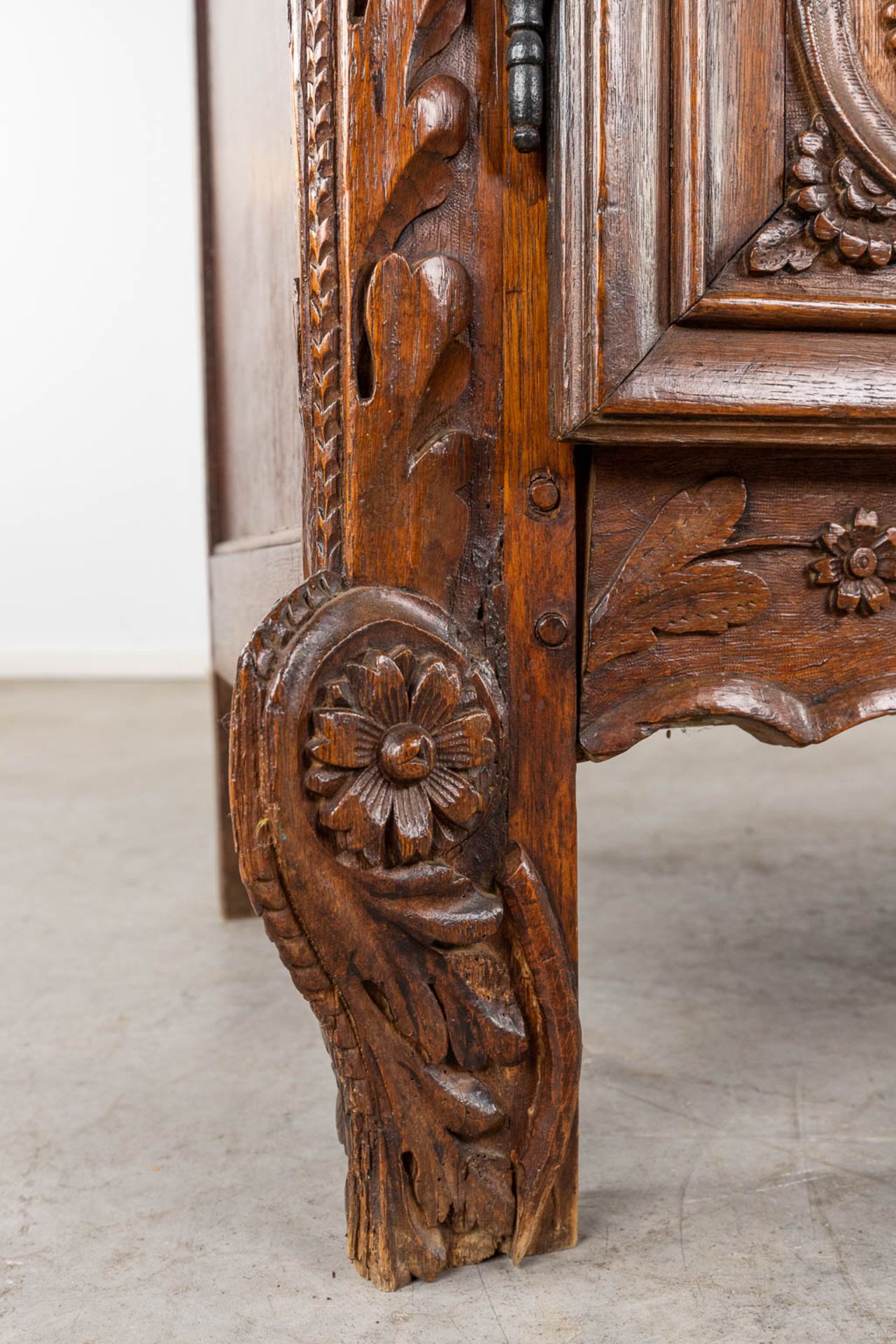 A richly sculptured and antique Normandy high cabinet, Armoire. France, 18th C. (D:68 x W:175 x H:23 - Image 4 of 21