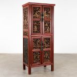 A Chinese cabinet with finely sculptured lacquered and gilt wood panels, 19th/20th C. (D:47 x W:73 x