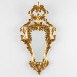 An antiqe mirror, sculptured and gilt wood, Roccoco style. Circa 1900. (W:42 x H:82 cm)