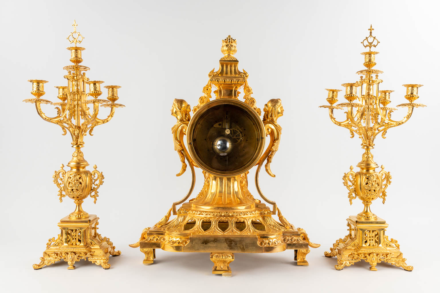 A three-piece mantle garniture clock and candelabra, gilt bronze in Louis XV style. 19th C. (D:28 x - Image 6 of 16